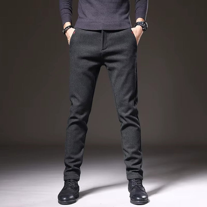 Henderson Slim-Fit Pants in dark grey, showcasing a flexible tailored fit and modern design for versatile wear.
