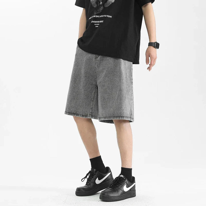 Lennox Men's Relaxed Denim Shorts in washed black, loose fit perfect for casual wear with oversized tops and sneakers.