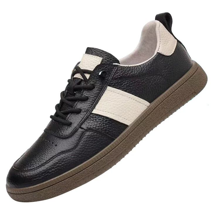 Axel Street Comfort Sneakers in black leather with contrasting side panels and cushioned sole for all-day wear.