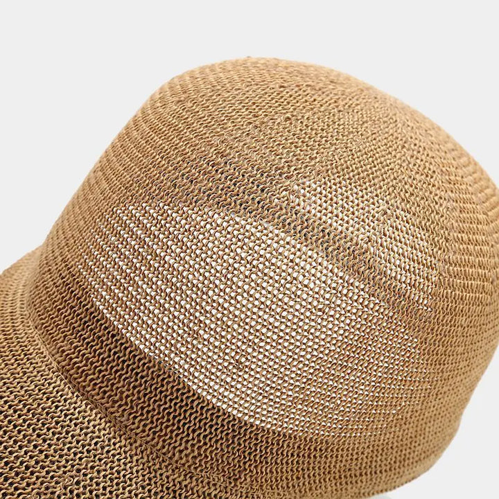 Bayfield Sun Cap in breathable woven material, featuring a lightweight design and curved brim for sun protection.