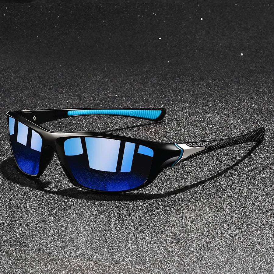 Nitro polarized sunglasses with sleek black and blue design, UV400 protection, and anti-glare lens for sporty activities.