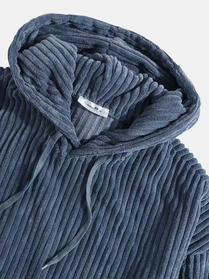 Summit Corduroy Hoodie featuring a luxurious ribbed texture and cozy hood for all-day comfort and style.