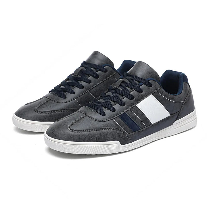 Rival Sport Sneakers featuring retro style, contrast paneling, and a cushioned insole for all-day comfort.