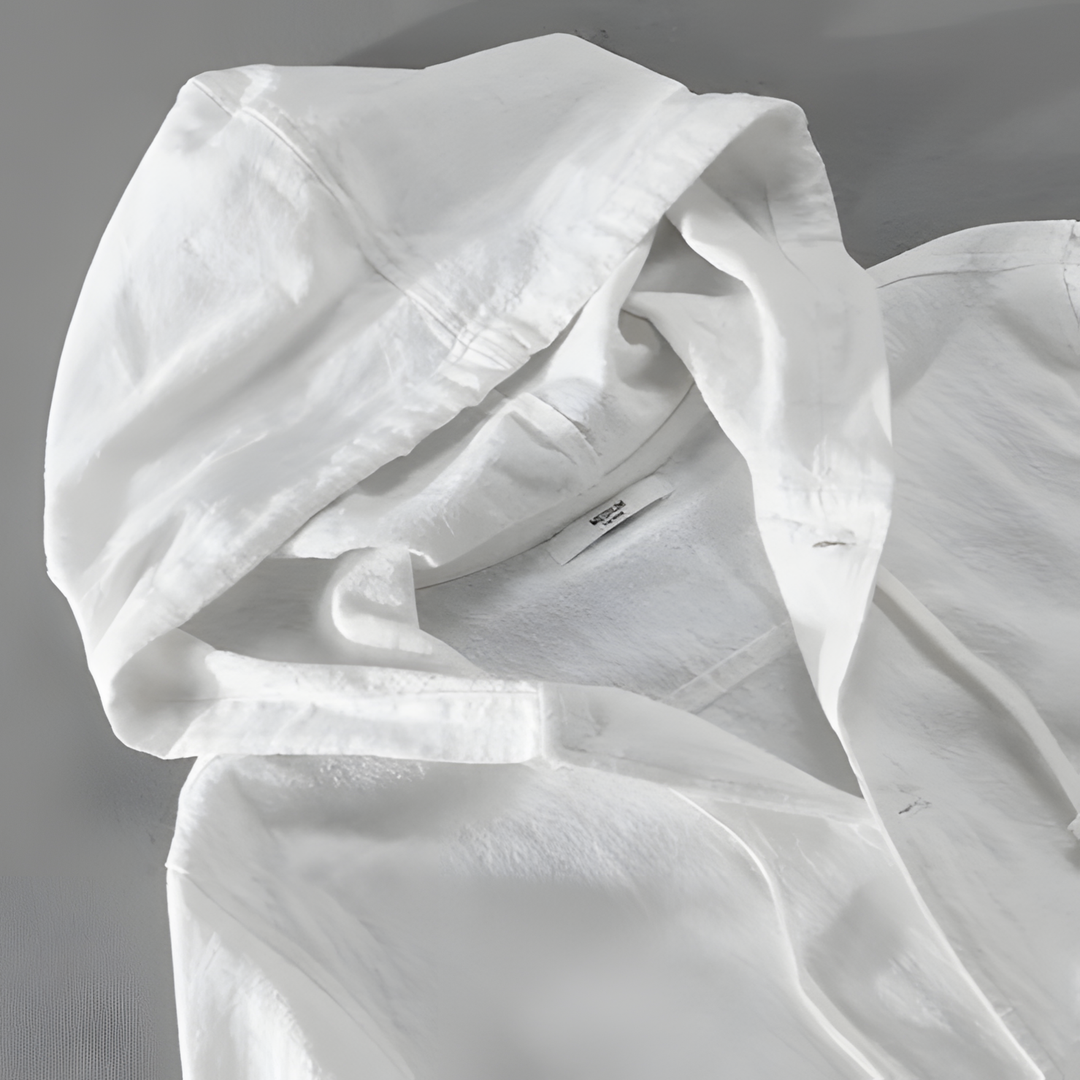Element Linen Hoodie with roomy hood, adjustable drawstring, and front button closure, showcasing a premium linen-cotton blend.