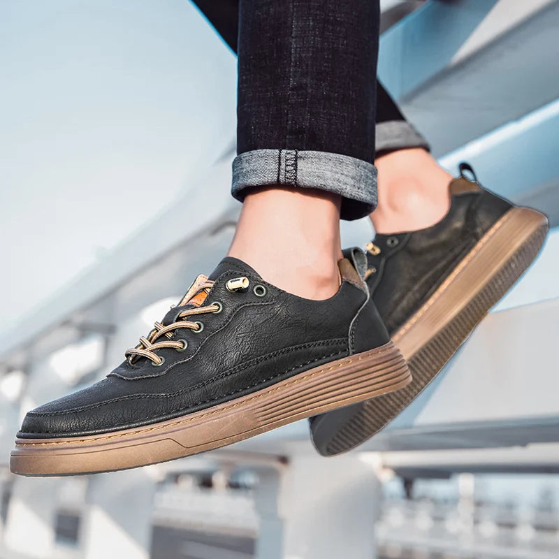 Alvo Genuine Leather Sneakers in black, featuring hand-stitched details and a comfortable sole, ideal for everyday wear.