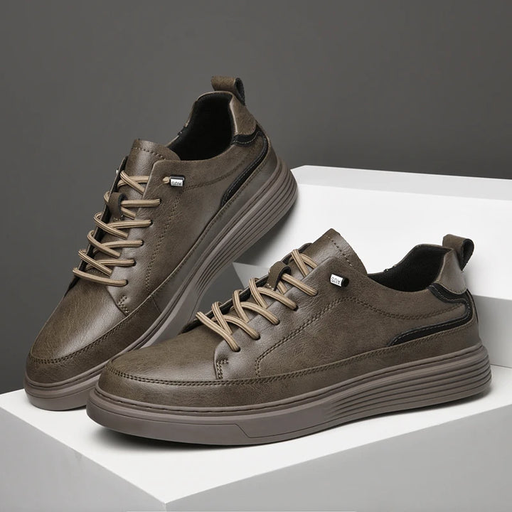 Genesis Leather Sneakers in brown with genuine leather upper, cushioned interior, and durable rubber sole for stylish comfort.