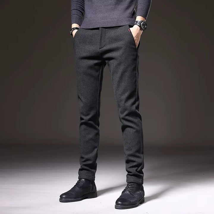 Henderson Slim-Fit Pants in dark color, showcasing a modern tailored design, perfect for casual and polished looks.