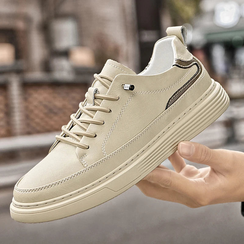 Genesis Leather Sneakers, featuring genuine leather upper, cushioned interior, and durable rubber sole for style and comfort.