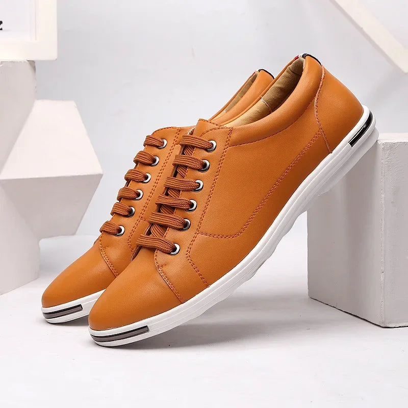 Paxton Low-Top Comfort Sneakers in tan leather with hidden lacing, featuring plush insoles for all-day ease.