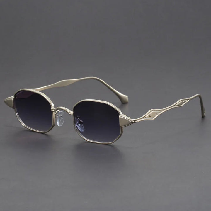Atlas Alloy sunglasses featuring geometric frames and sculpted metal arms for stylish UV protection and comfort.