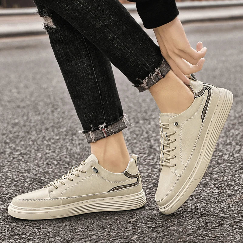 Genuine leather Genesis sneakers featuring cushioned interior and durable rubber sole, perfect for versatile style and comfort.