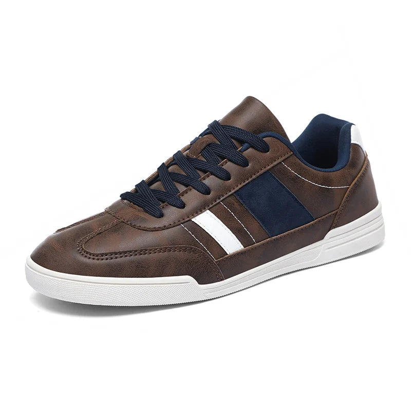 Rival Sport Sneakers with retro design, brown leather, and navy contrast panels for stylish comfort and versatility.