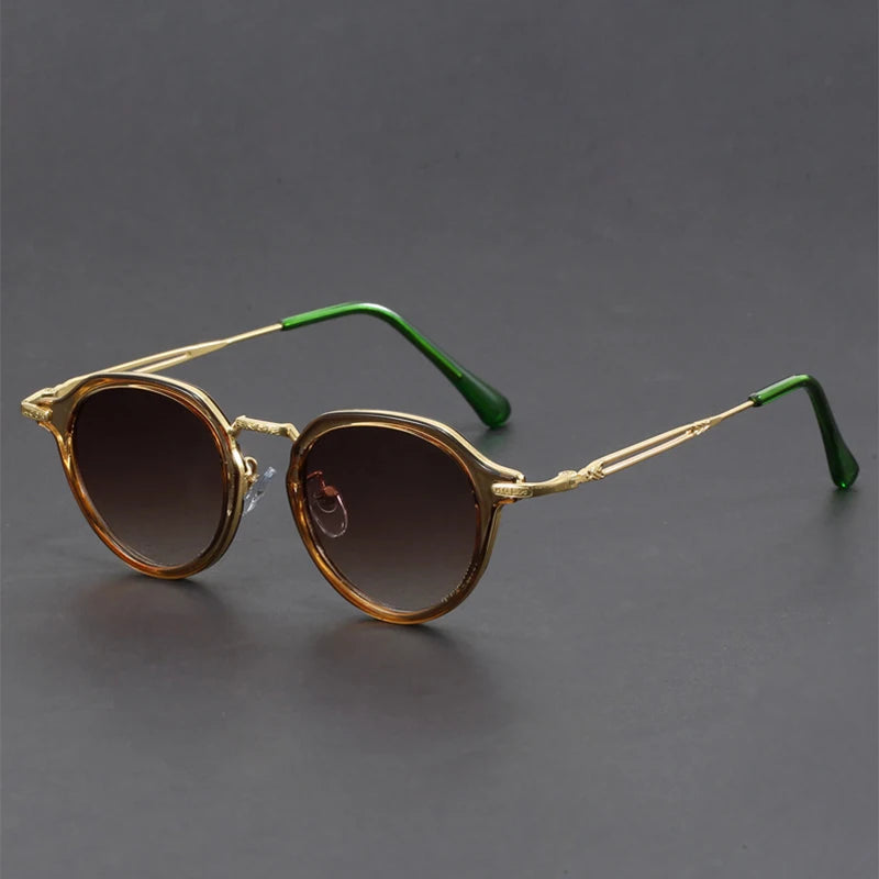 Vista Retro Shades with gold round metal frame and contrasting green temple arms, featuring UV400 lenses for sun protection.