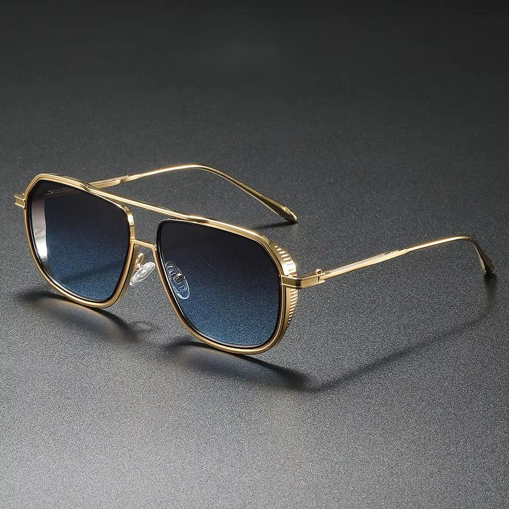 Alloy aviator sunglasses with geometric frame shape and UV-protective tinted lenses on a dark background.