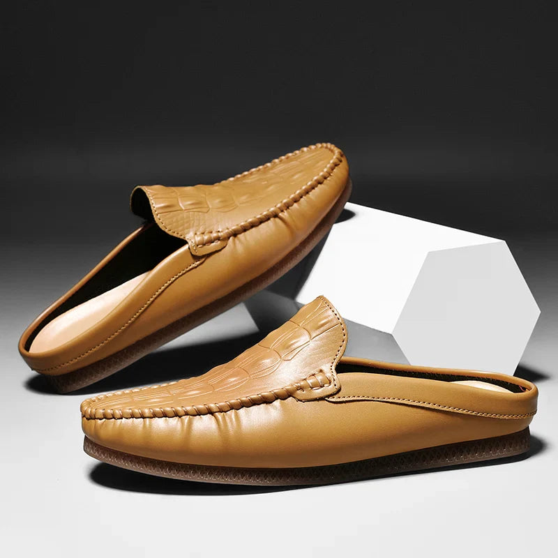 Gianni Backless Slide Loafers in tan with embossed upper and classic moc toe, designed for comfort and style.