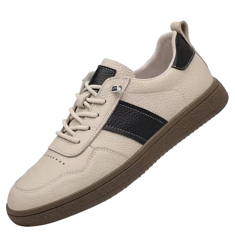 Axel Street Comfort Sneakers in beige leather with black side panel and cushioned sole, perfect for all-day wear.