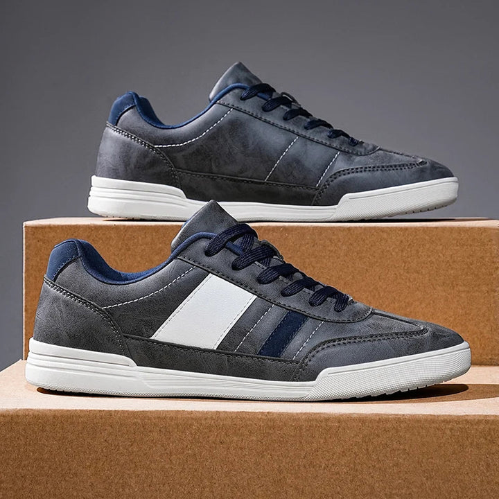 Rival™ Sport Sneakers showcasing retro style with contrast paneling and cushioned insole, perfect for everyday wear.