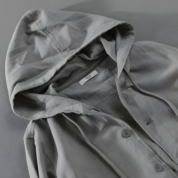 Element Linen Hoodie in gray featuring a roomy hood, adjustable drawstring, and heavy-duty button closure.