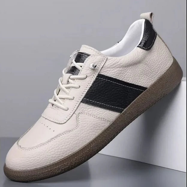 Axel Street Comfort Sneakers, genuine leather, textured finish, cushioned sole, modern style for all-day wear.