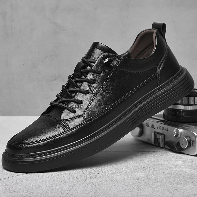 Aristo Oxford Shoes: Black genuine leather low-top sneakers with bold laces and cushioned sole for casual or formal wear.