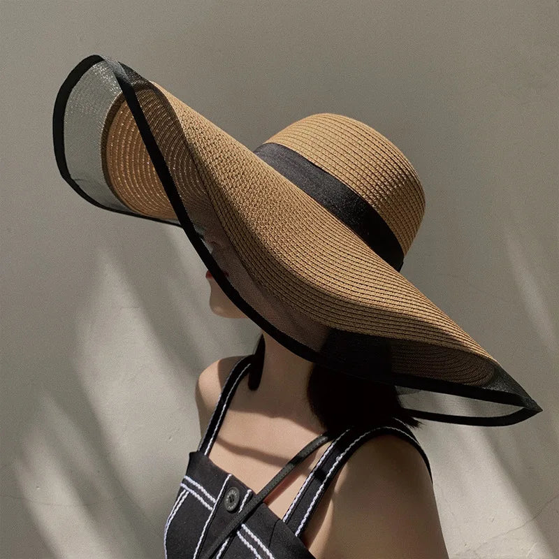 Sorella Shade Hat in tan with extra-wide brim, perfect for summer lounging at the beach or pool.