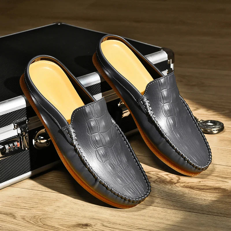 Gianni Backless Slide Loafers in embossed leather with moc toe, perfect for all-day comfort and stylish casual wear.