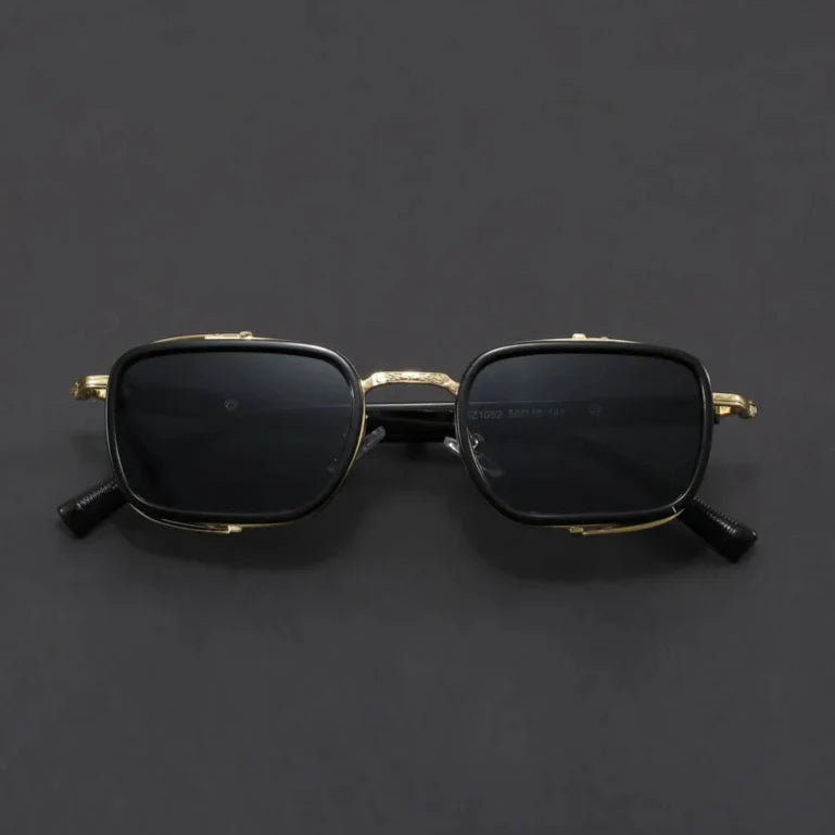 Elias Rectangle Frame Sunglasses featuring sleek polished metal frames and square lenses for modern style.