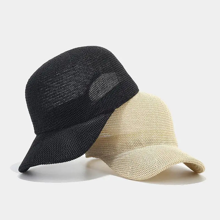 Bayfield Sun Cap in black and beige, lightweight woven design for sun protection and stylish summer wear.