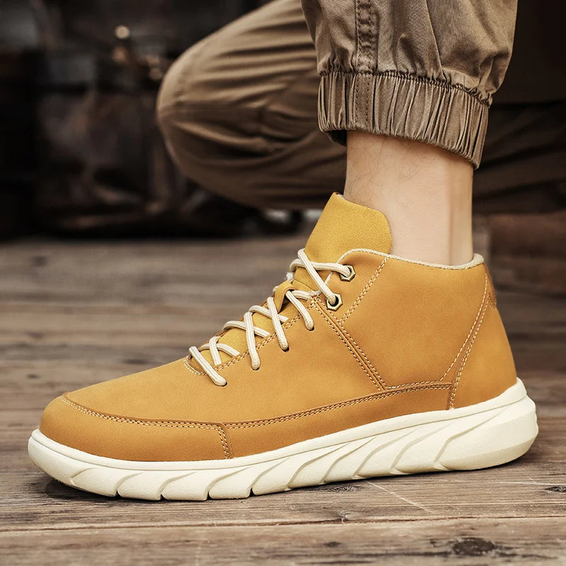 Summit Leather Mid-Tops in tan, featuring cushioned sole and lace-up design for style and comfort.