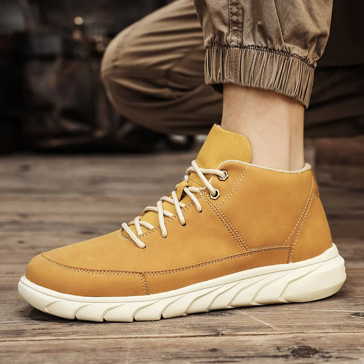 Summit Leather Mid-Tops in tan, featuring cushioned sole and lace-up design for style and comfort.