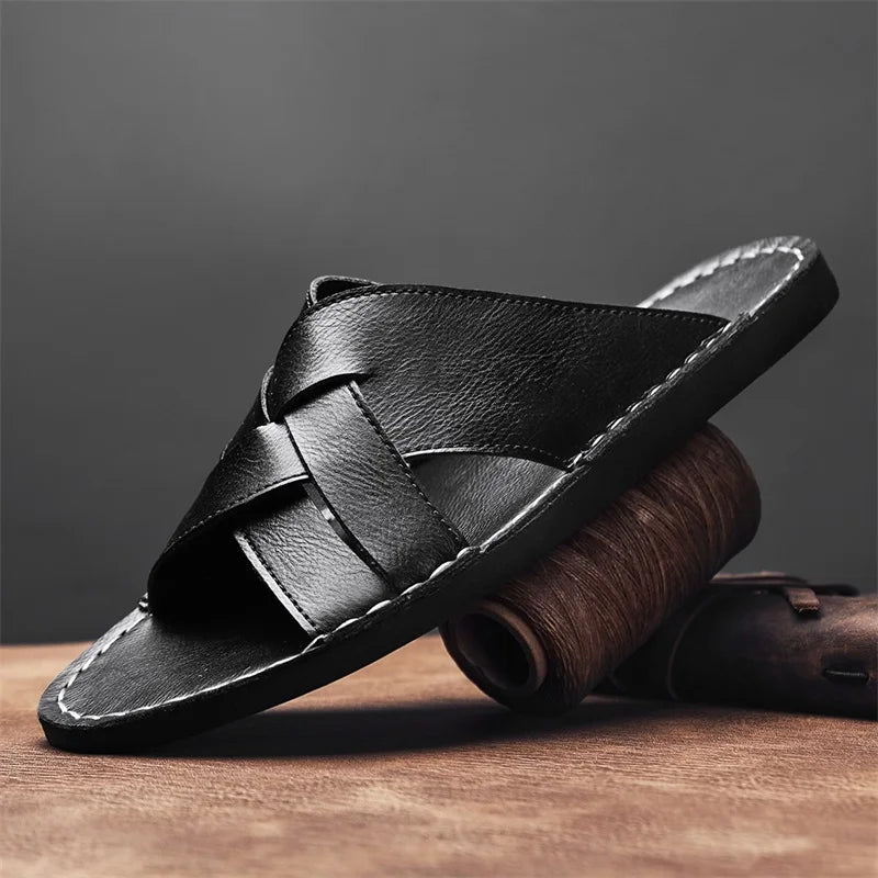 Kairo genuine leather crossover sandals featuring a stylish black design and contoured footbed for all-day comfort.
