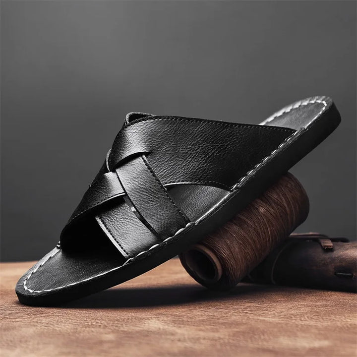 Kairo genuine leather crossover sandals featuring a stylish black design and contoured footbed for all-day comfort.