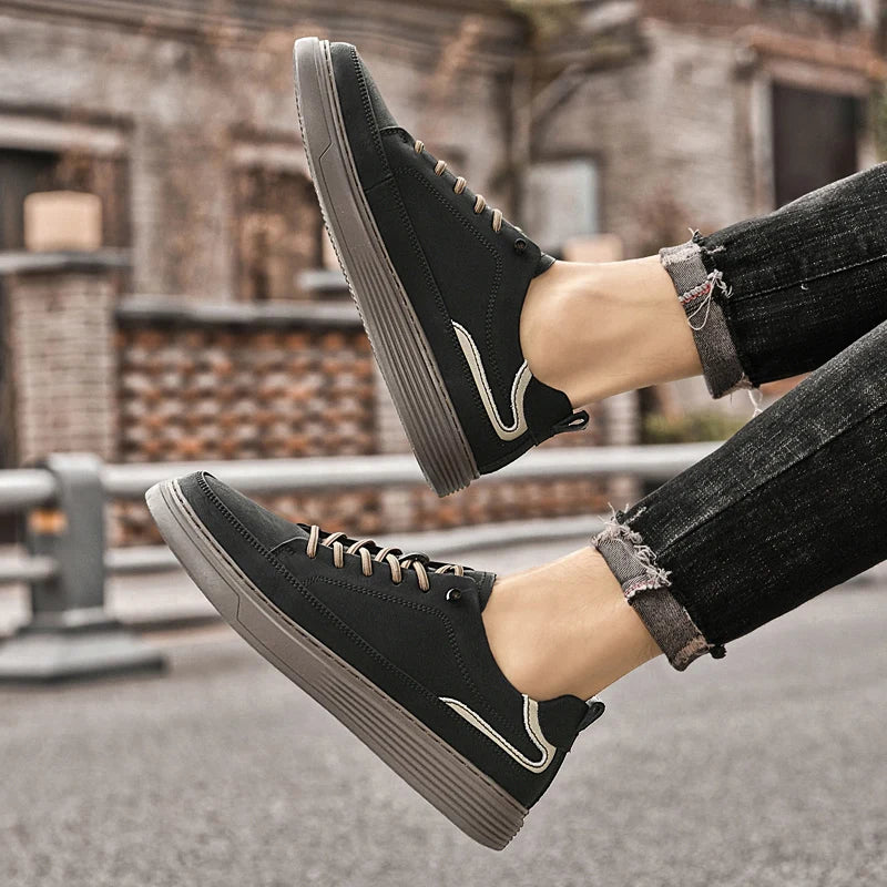 Genesis Leather Sneakers in black with cushioned interior and durable rubber sole, perfect for any occasion.
