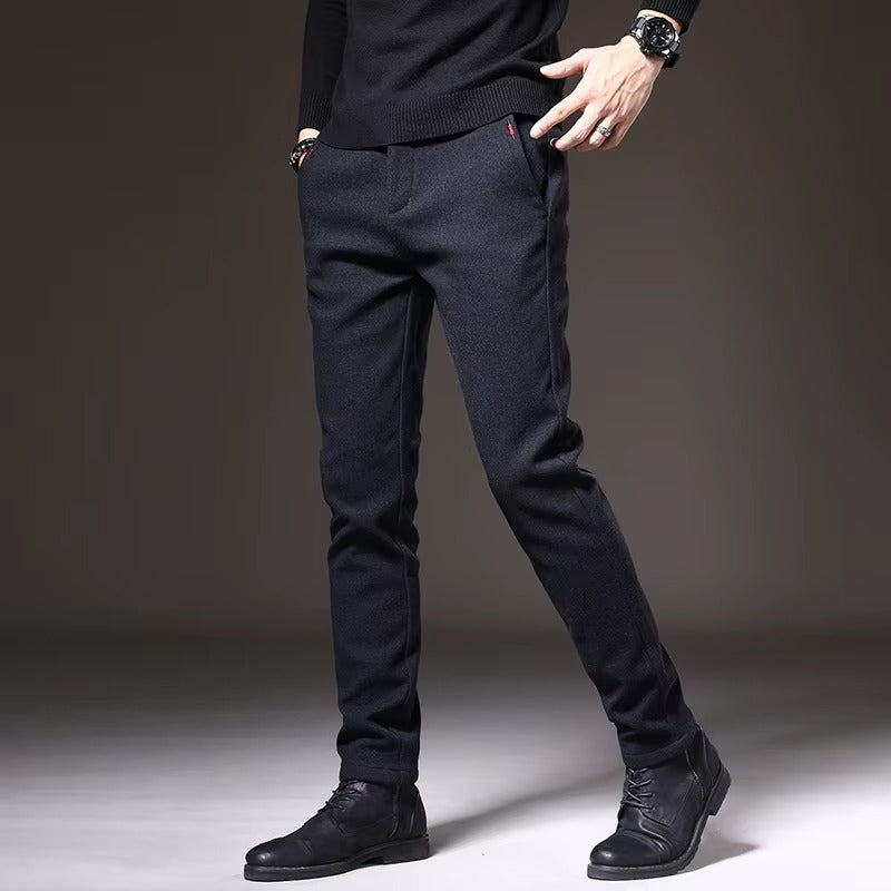 Henderson slim-fit pants in dark color, featuring a modern tailored look, perfect for casual and polished occasions.