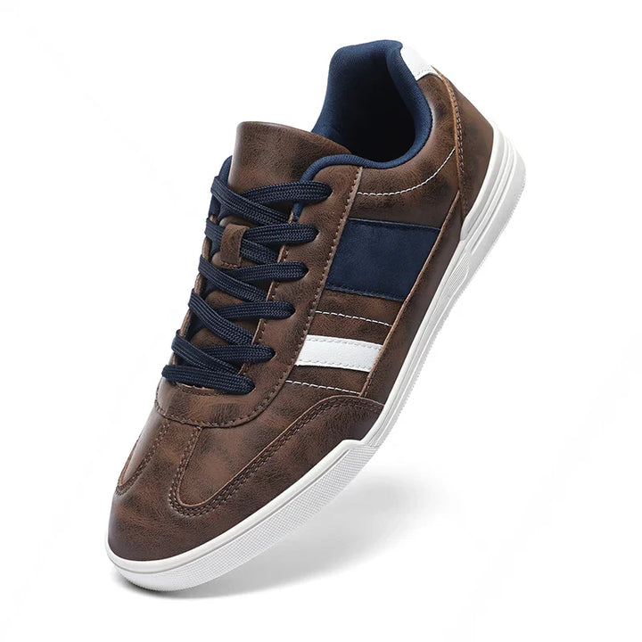 Rival Sport Sneakers featuring bold retro style, sleek low-profile design, and contrast paneling in brown and navy.