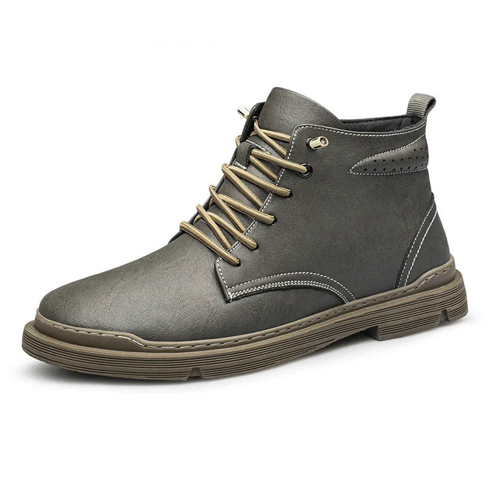 Wayfarer Genuine Leather Hi-Tops in gray with reinforced stitching and durable rubber sole.