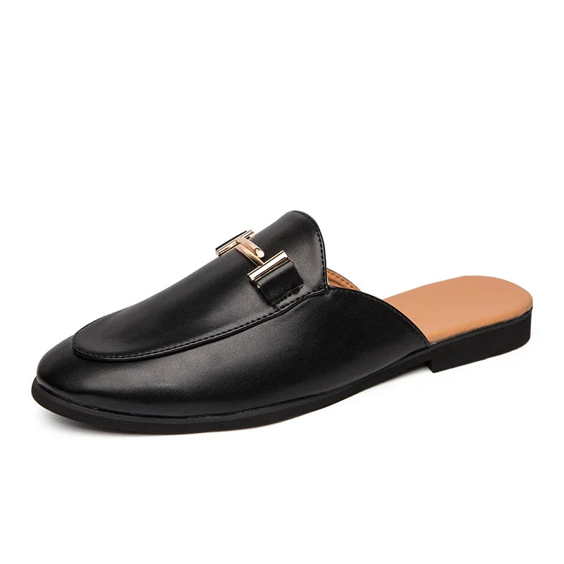 Santino Backless Slide Loafers in sleek black leather with gold bit hardware and open-back design for effortless wear.
