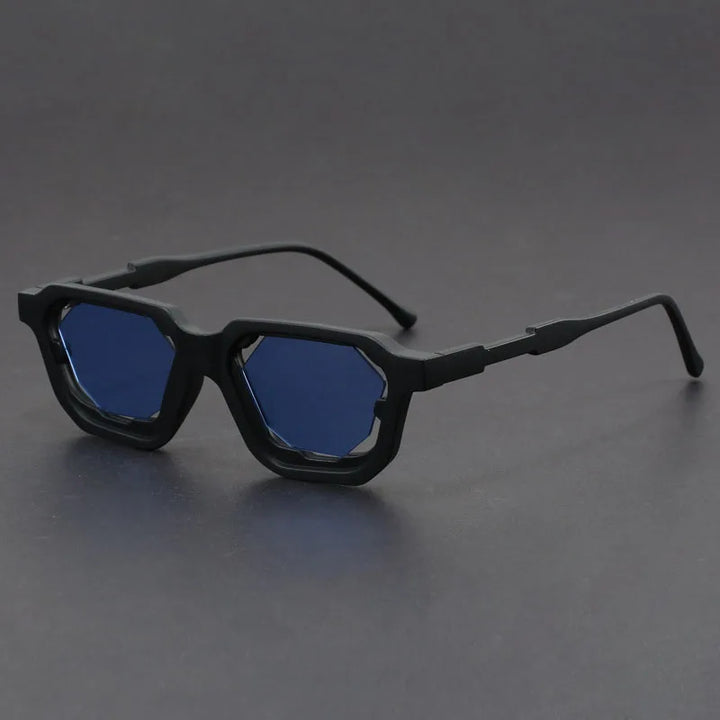 Vantor sunglasses with sharp geometric frame, thick edges, and blue lenses, offering stylish UV400 protection.