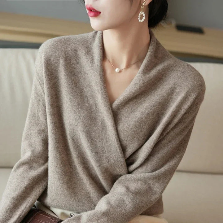 Crossover wool sweater with a wrap-front design, showcasing a soft, relaxed fit for effortless elegance and comfort.