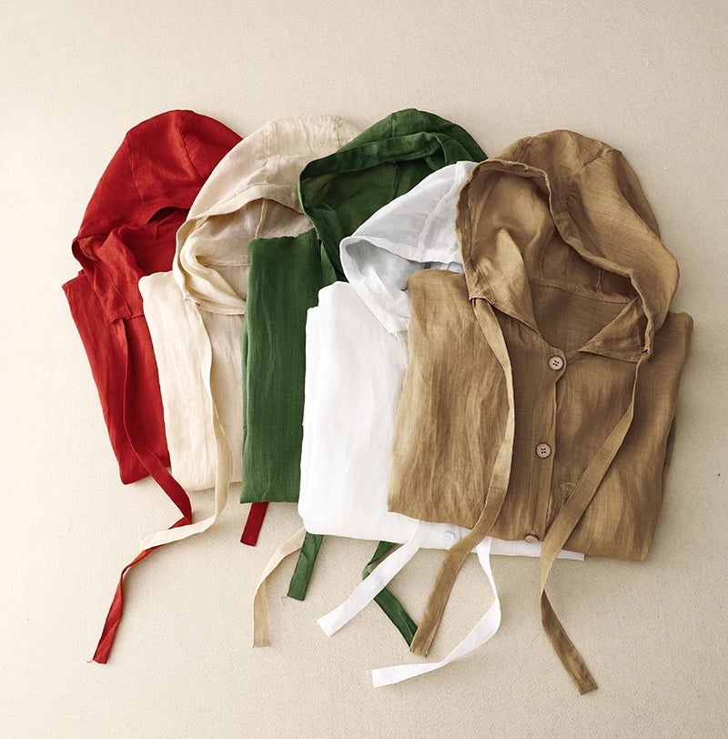 Colorful collection of Calypso Coast linen hoodies in red, green, white, and beige, showcasing soft cotton-linen blend fabric.