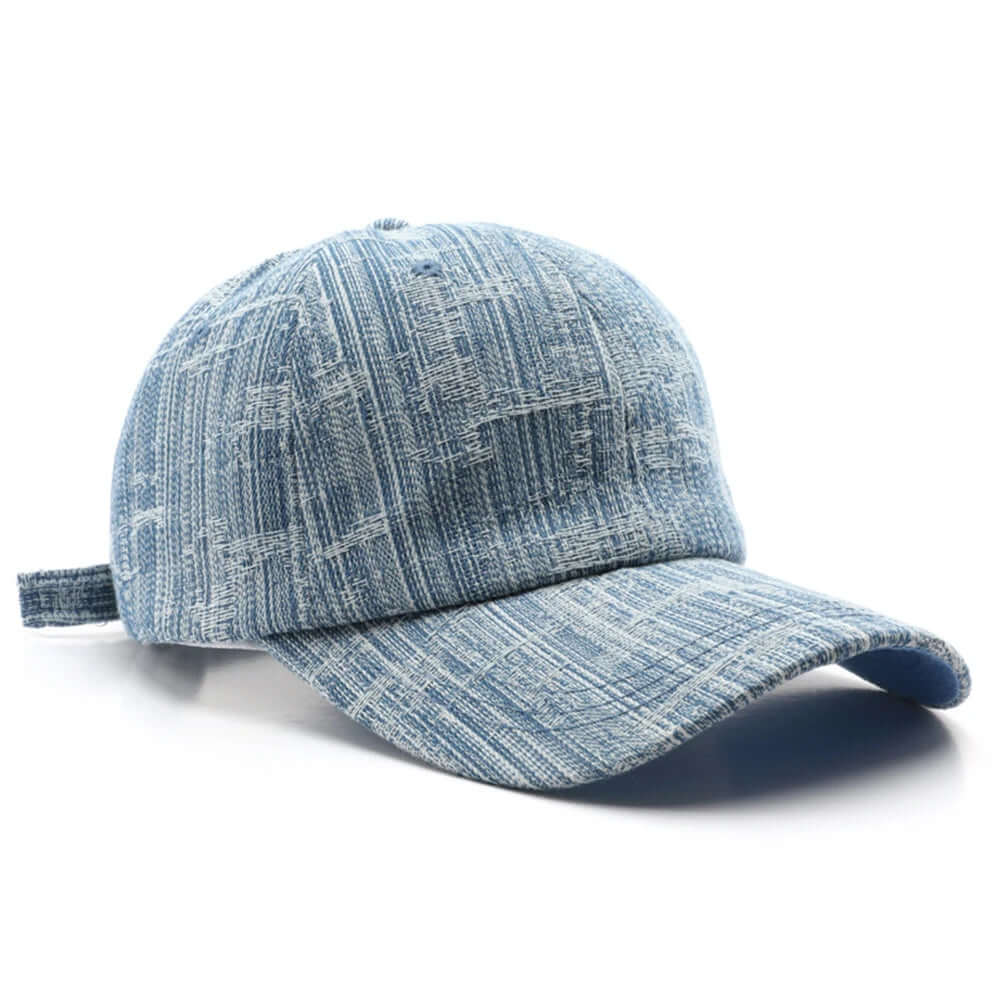 Wyatt Street denim cap featuring vintage wash, worn-in look, adjustable strap, and rugged character for everyday wear.