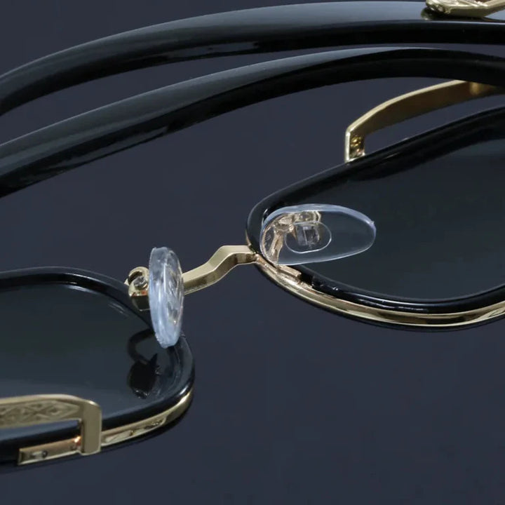 Close-up of Elias Rectangle Frame Sunglasses showcasing sleek black frame and adjustable nose cushions.