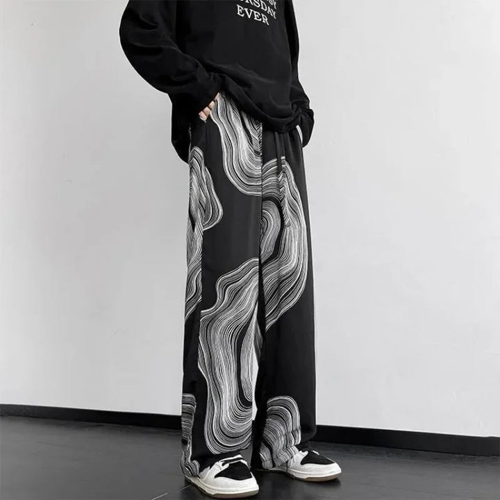 Vortex Ripple Pants featuring a flowing wide-leg design with an abstract print, ideal for effortless movement and comfort.
