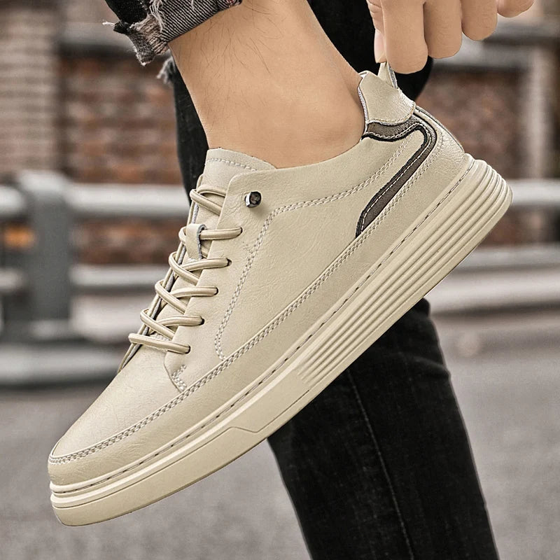 Genesis Leather Sneakers in beige, featuring genuine leather upper, cushioned interior, and durable rubber sole for style and comfort.