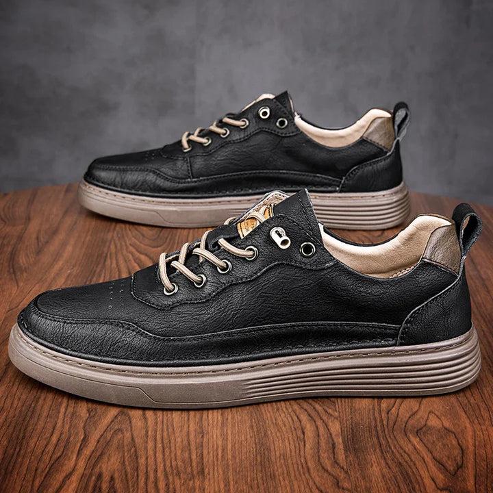 Alvo Genuine Leather Sneakers in black, featuring hand-stitched details and responsive sole for comfort and style.