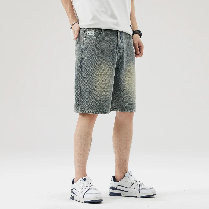 Men's Axel Faded Wash Denim Shorts featuring unique crosshatch weave and relaxed straight-leg fit, perfect for streetwear.
