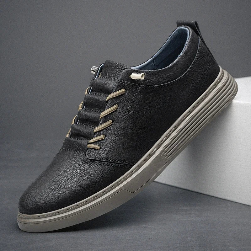 Ashton genuine leather sneakers in black with precision stitching and cloud-like cushioning for ultimate comfort.