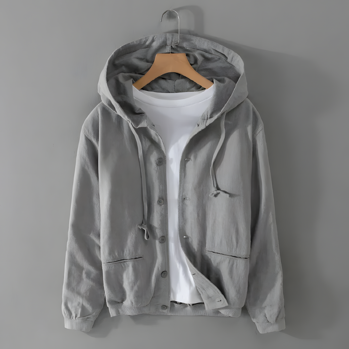 Element Linen Hoodie in gray, showcasing a roomy hood, front button closure, and soft linen-cotton blend fabric.