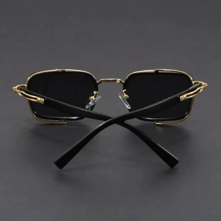 Elias rectangle frame sunglasses with sleek metal design and black lenses, offering UV protection and adjustable fit.