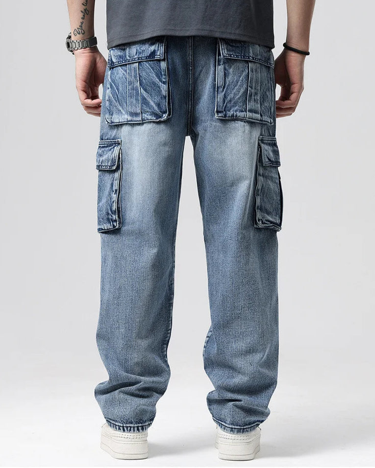 Back view of Ryder Washed Cargo Jeans with oversized pockets and relaxed wide-leg fit in durable denim.